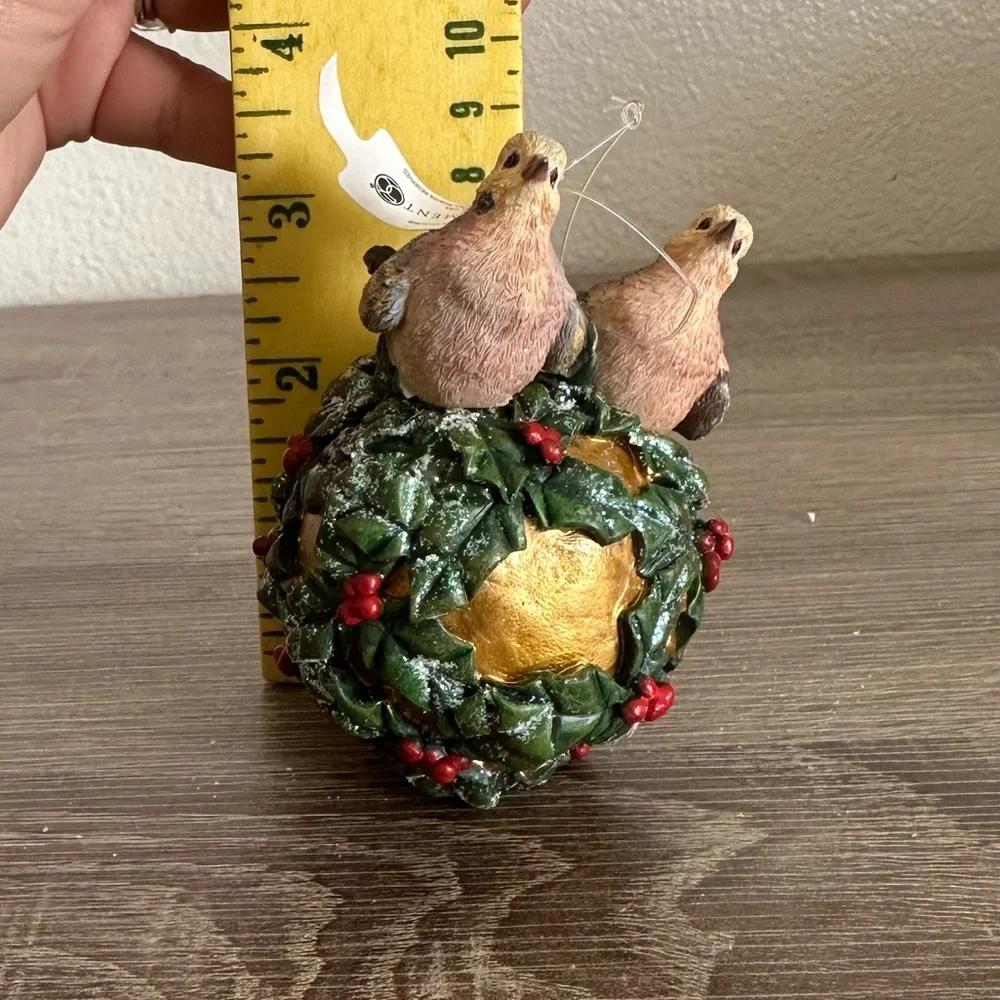 Decorative Bird Ornament with Green and Gold Accents